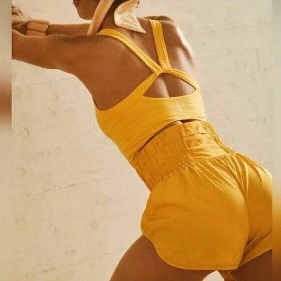 Free People | FP Movement The Way Home Runsie Romper in Marigold Yellow - Picture 3 of 7